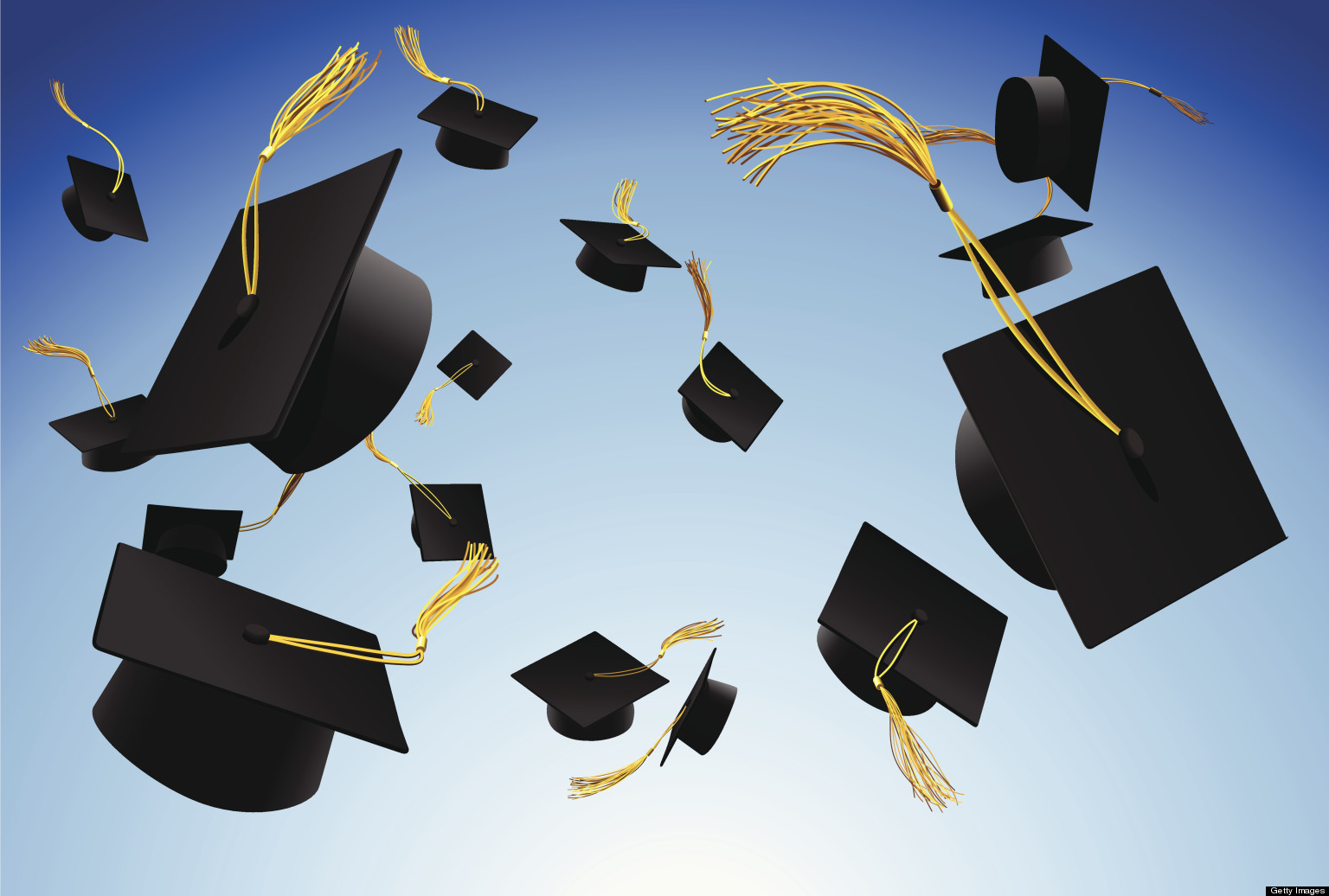 Graduation caps thrown in the air