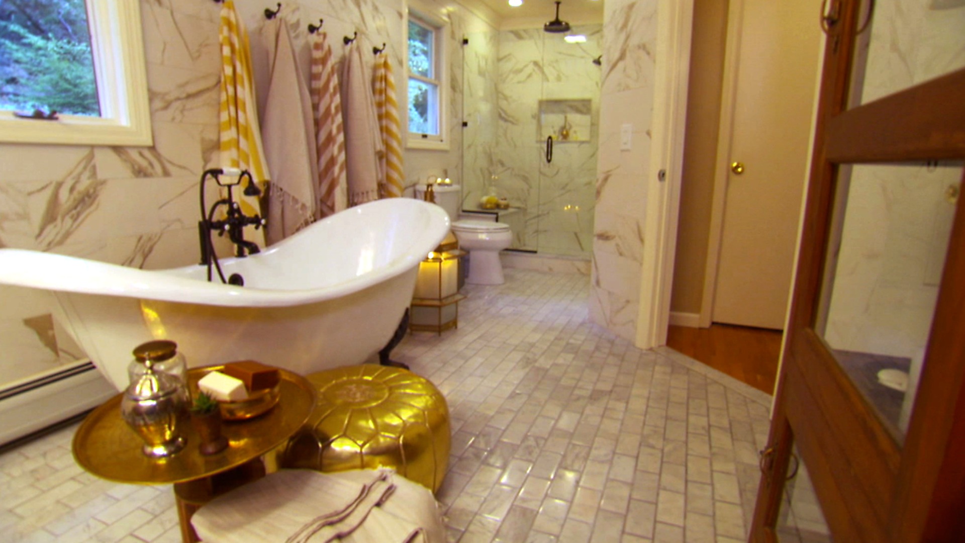 The claw foot bathtub is the focus in this master bathroom.